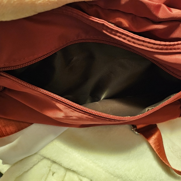 A small shoulder or crossbody purse with a ton of pockets to carry everything! - Picture 6 of 15